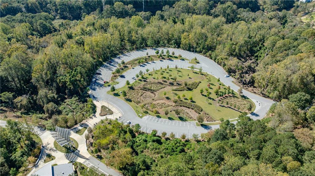 1032 Robert Smalls Way Atlanta, GA 30318 - Photo 67 of 74 an aerial view of a house with a yard and red trees