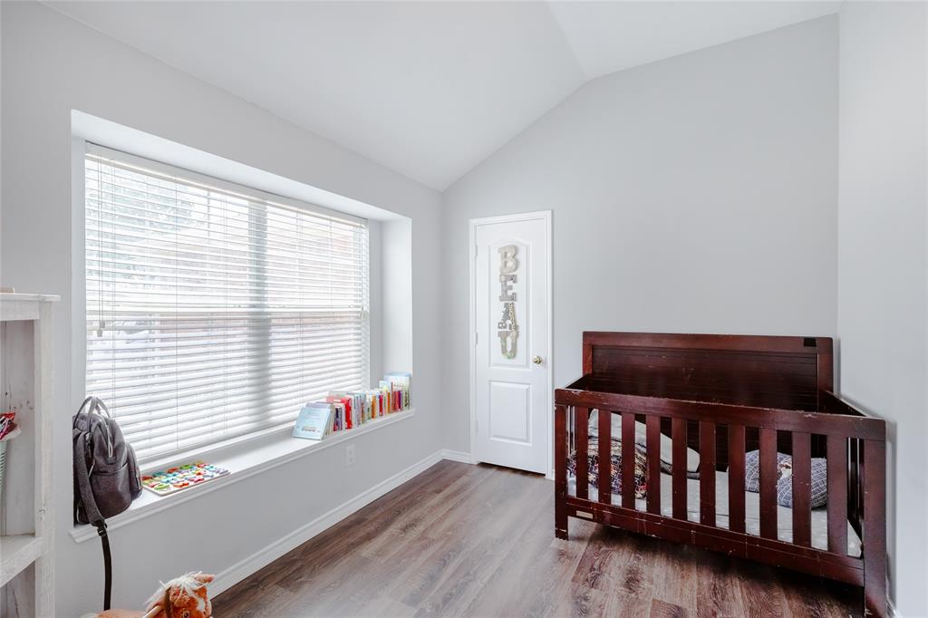 3729 Cook Court Fort Worth, TX 76244 - Photo 16 of 24 a bedroom with furniture and a window