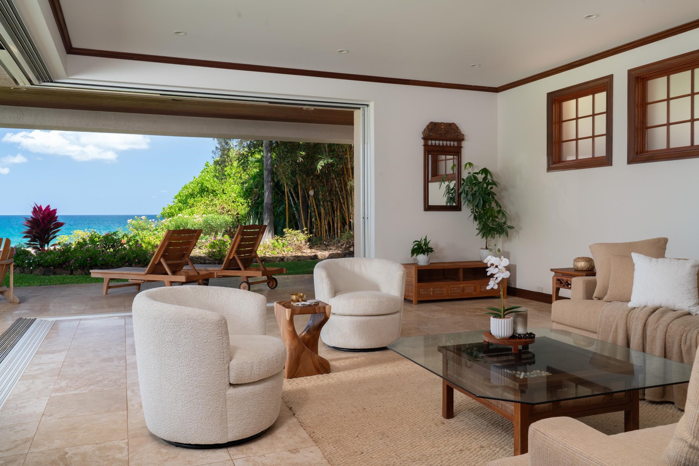 3002 South Kihei Road Kihei, HI 96753 - Photo 11 of 31 a living room with furniture and a large window