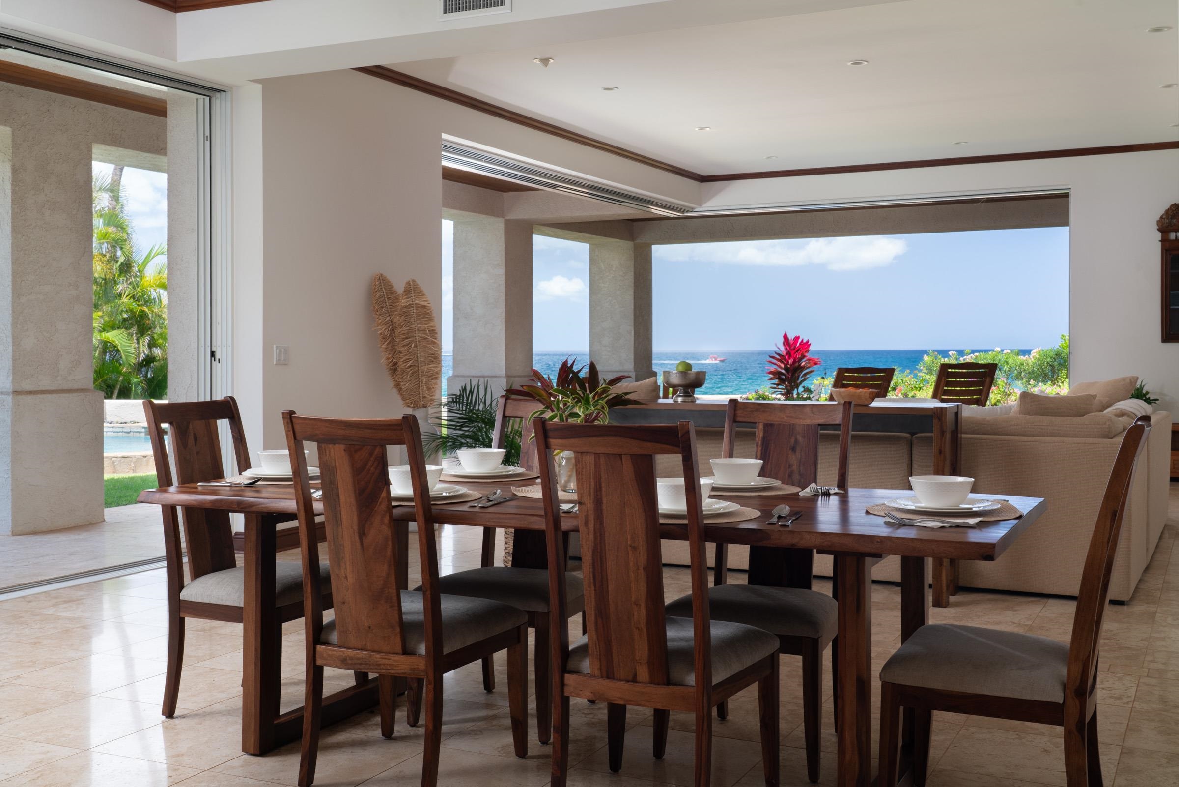 3002 South Kihei Road Kihei, HI 96753 - Photo 14 of 31 a view of a dining room with furniture and a potted plant