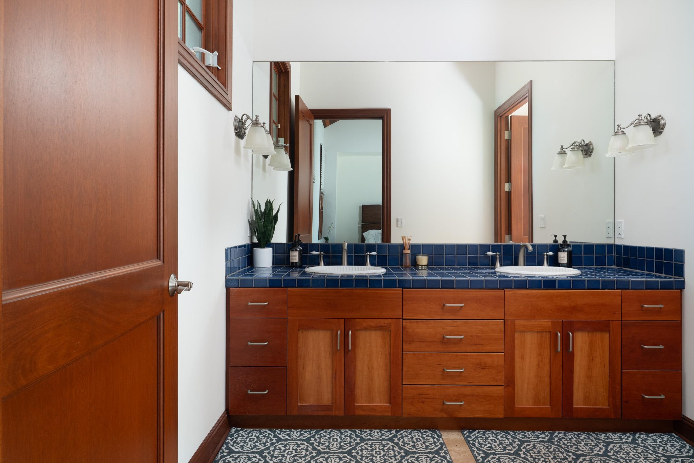 3002 South Kihei Road Kihei, HI 96753 - Photo 20 of 31 a bathroom with a sink a mirror and vanity