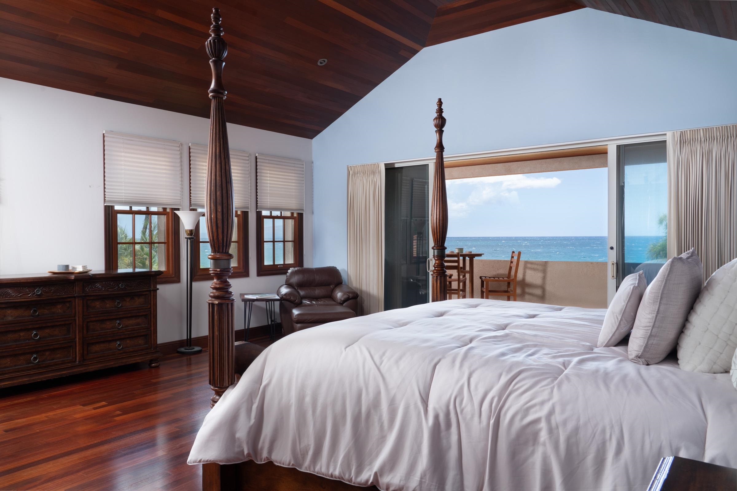 3002 South Kihei Road Kihei, HI 96753 - Photo 22 of 31 a bedroom with a bed window and a flat tv screen