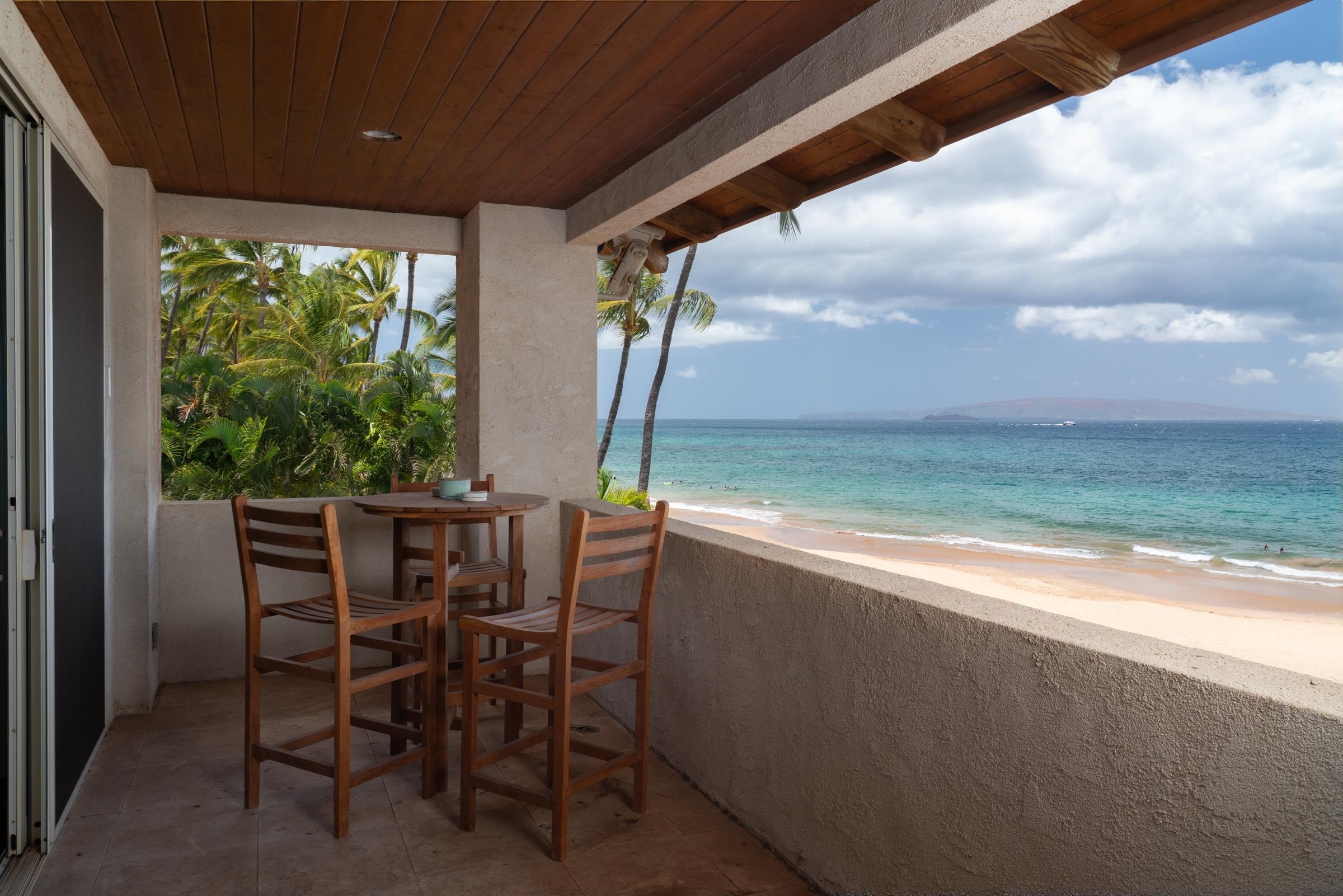 3002 South Kihei Road Kihei, HI 96753 - Photo 23 of 31 a view of an outdoor dining space with furniture