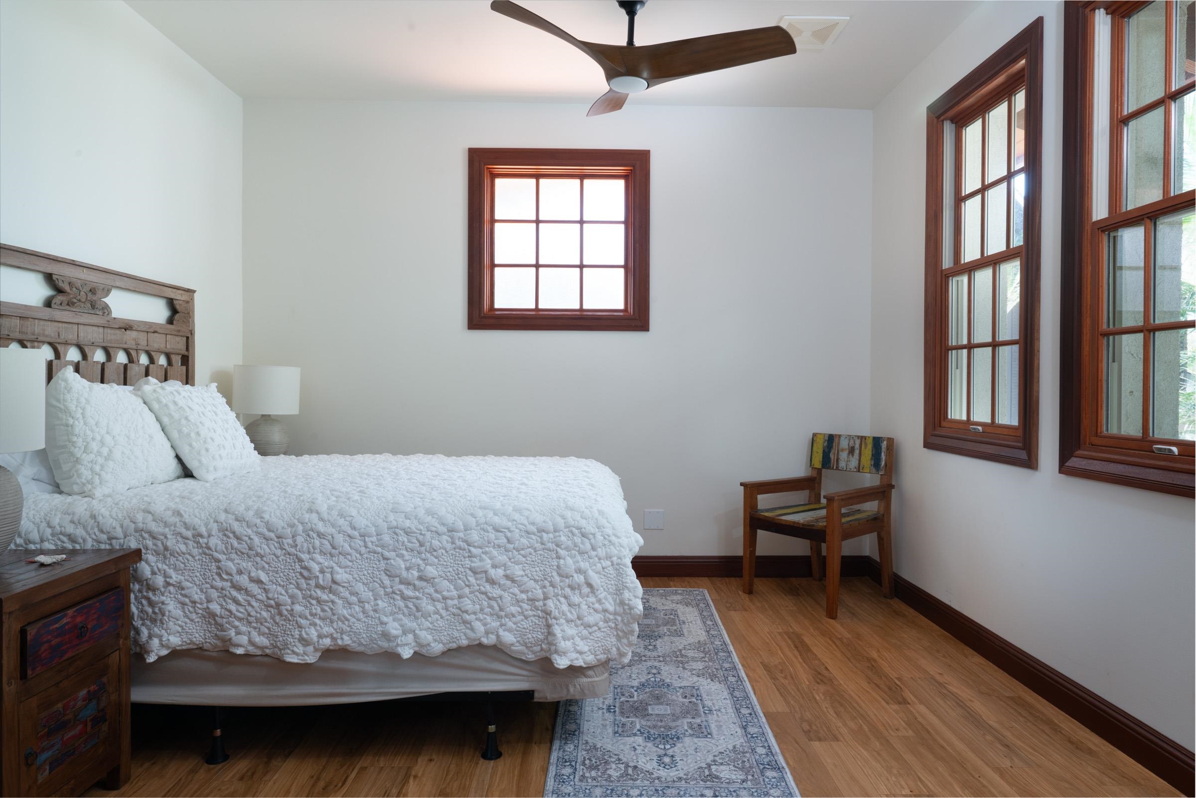 3002 South Kihei Road Kihei, HI 96753 - Photo 24 of 31 a bedroom with a bed and a window