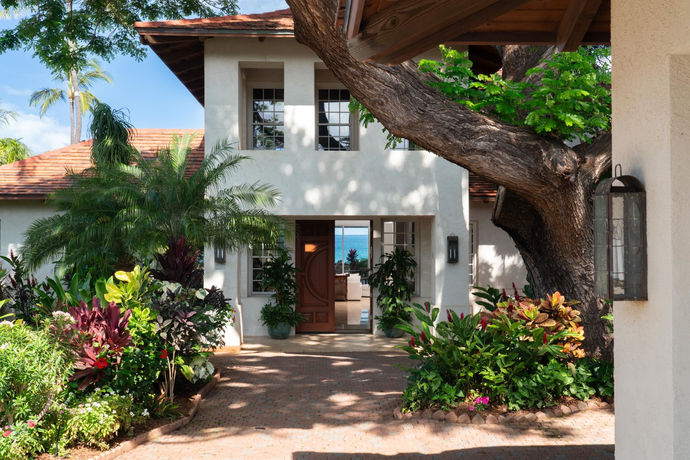 3002 South Kihei Road Kihei, HI 96753 - Photo 5 of 31 a front view of a house with a yard