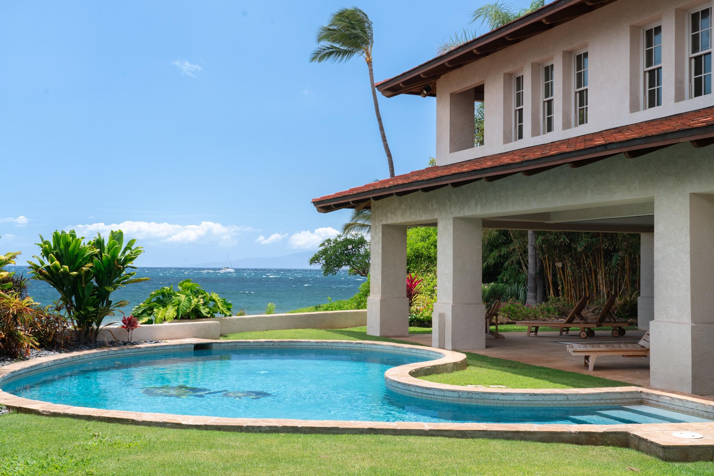 3002 South Kihei Road Kihei, HI 96753 - Photo 7 of 31 a view of a house with swimming pool