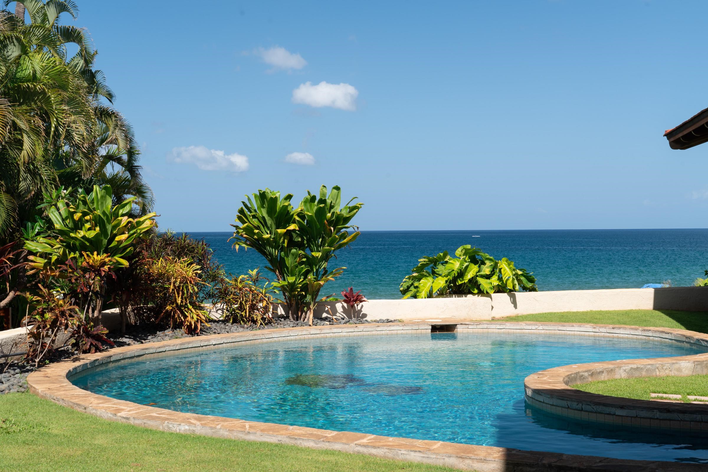 3002 South Kihei Road Kihei, HI 96753 - Photo 9 of 31 a view of a swimming pool with a yard