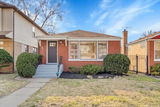 a view of a house with a garden