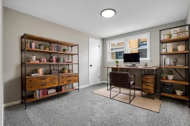 a bedroom with furniture cabinets and window