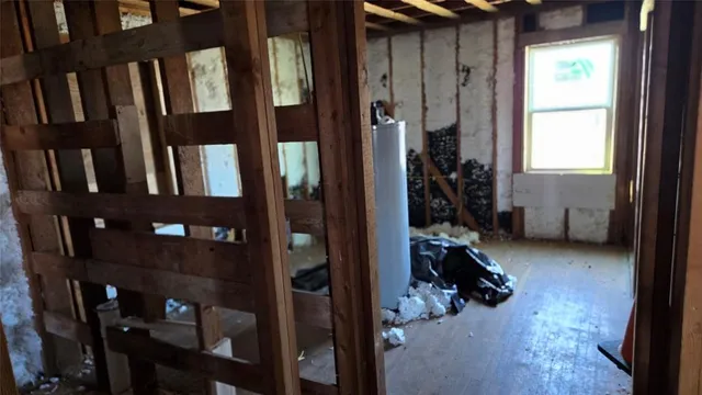 a view of a hallway with closet