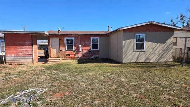 a house view with a garden space