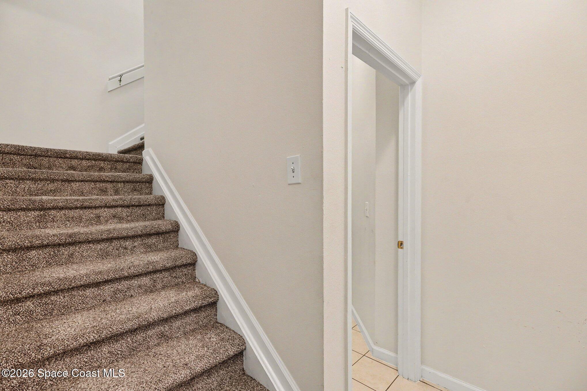 4066 Meander Place, Unit 203 Rockledge, FL 32955 - Photo 19 of 31 Stairs to main living area