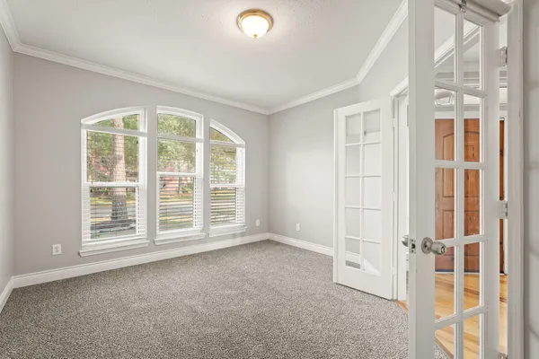 an empty room with windows