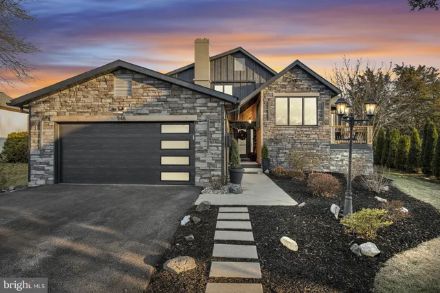 a front view of a house with yard
