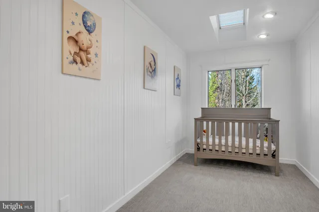 a bathroom with a toilet sink and shower