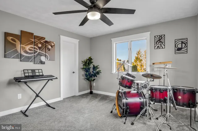 an aerial view of a house with a lake view