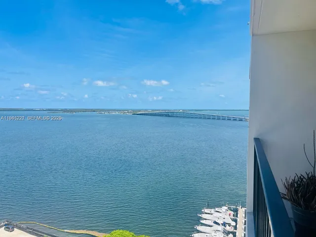 a view of a lake from a balcony