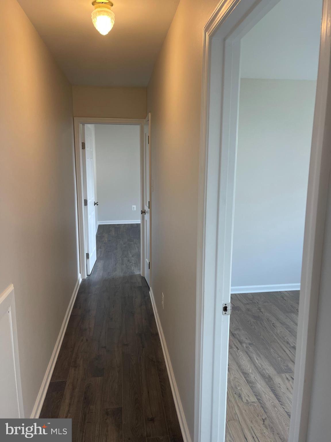 3142 Brinkley Road, Unit 6304 Temple Hills, MD 20748 - Photo 7 of 15 a view of a hallway