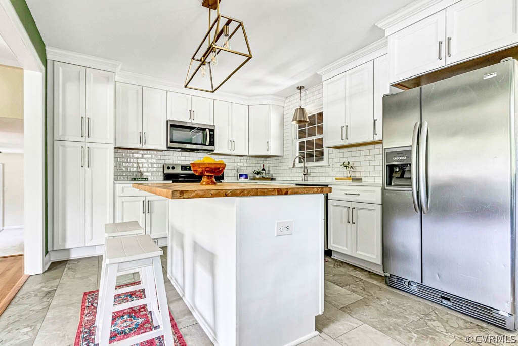 7800 Bronze Lane Prince George, VA 23875 - Photo 11 of 30 a kitchen with stainless steel appliances a refrigerator sink and microwave