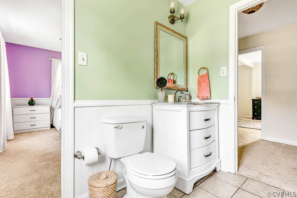 7800 Bronze Lane Prince George, VA 23875 - Photo 17 of 30 a bathroom with a granite countertop toilet sink and mirror