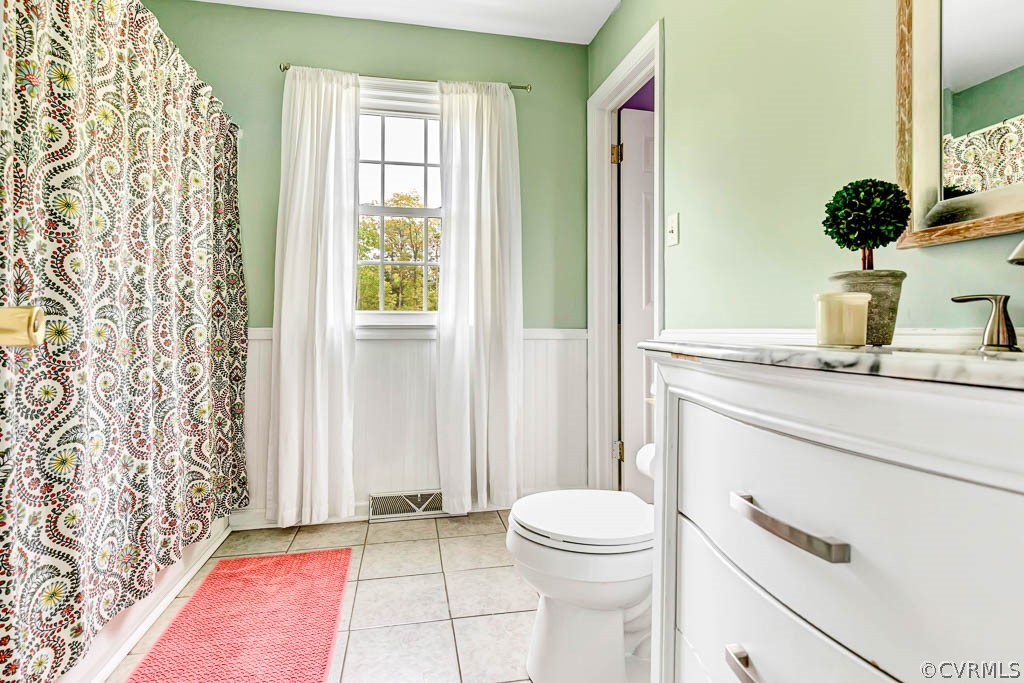 7800 Bronze Lane Prince George, VA 23875 - Photo 18 of 30 a bathroom with a sink a toilet and a window