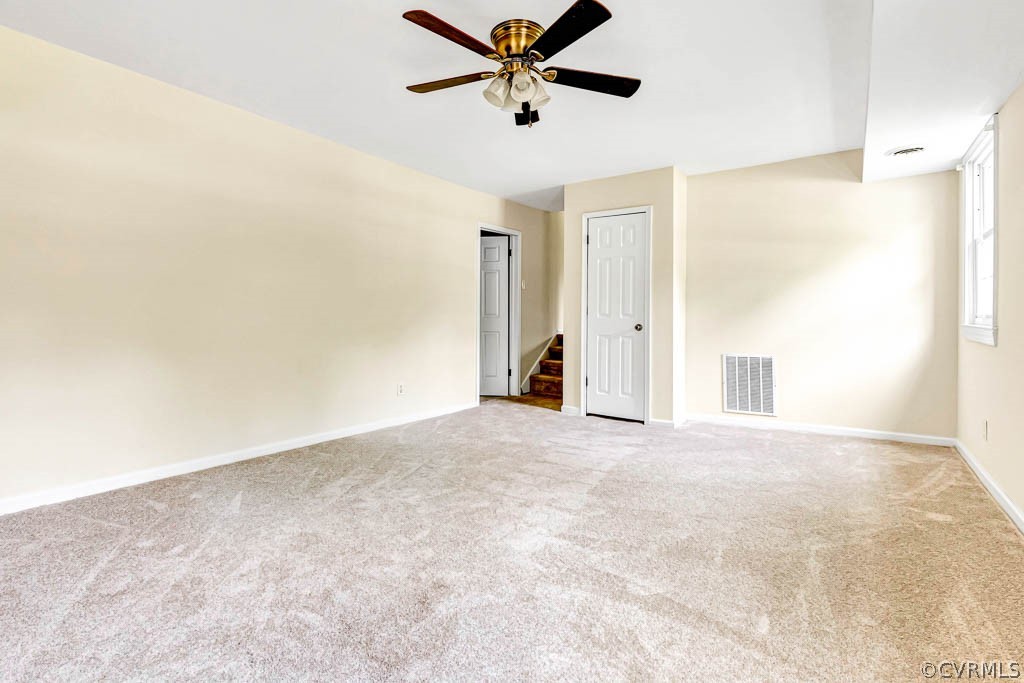 7800 Bronze Lane Prince George, VA 23875 - Photo 20 of 30 a view of a livingroom with a ceiling fan and window