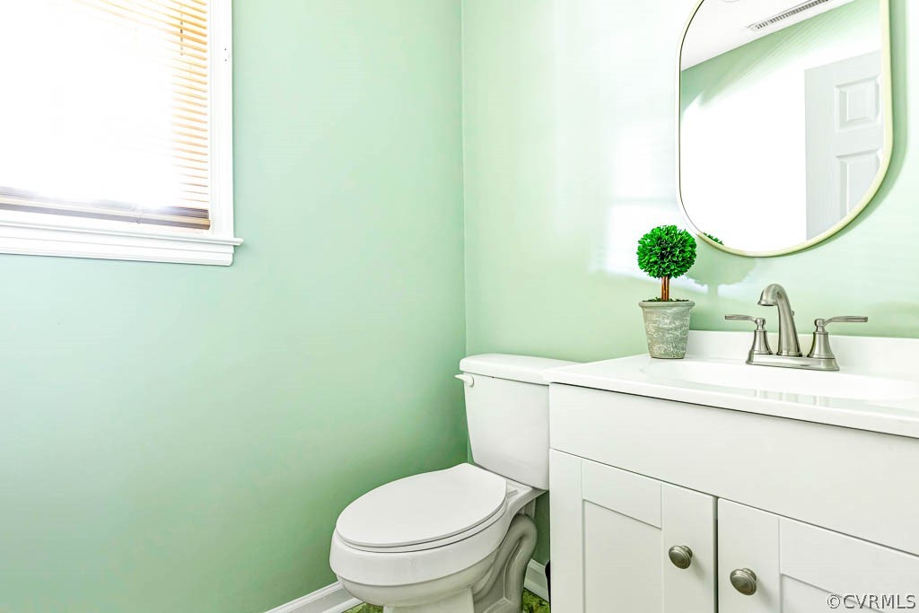 7800 Bronze Lane Prince George, VA 23875 - Photo 24 of 30 a bathroom with a sink mirror and toilet