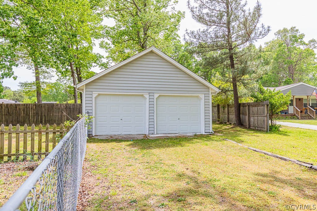 7800 Bronze Lane Prince George, VA 23875 - Photo 28 of 30 a view of a house with a yard and wooden fence