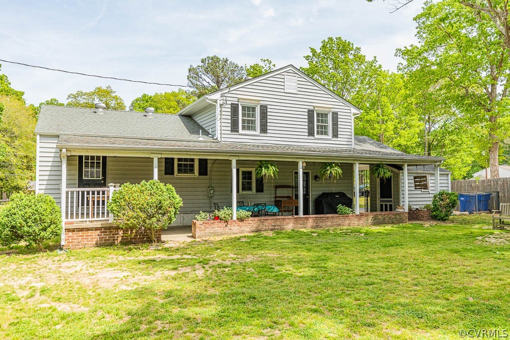 7800 Bronze Lane Prince George, VA 23875 - Photo 30 of 30 a front view of a house with a yard and porch