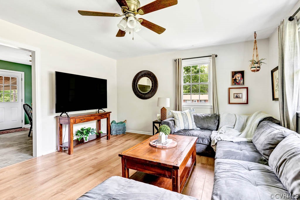 7800 Bronze Lane Prince George, VA 23875 - Photo 5 of 30 a living room with furniture and a flat screen tv