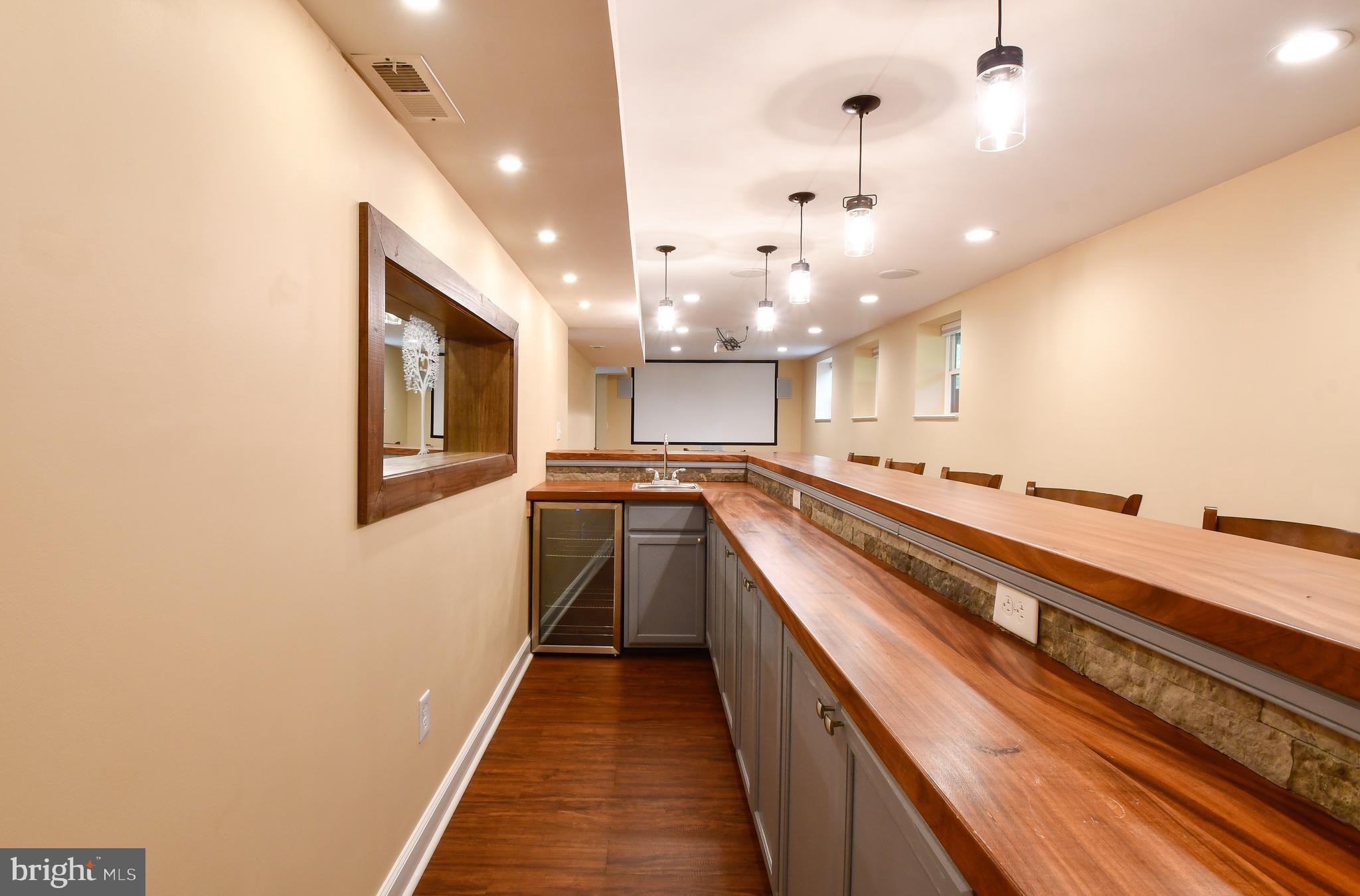 9811 Catharpin Road Spotsylvania, VA 22551 - Photo 25 of 33 Basement Bar with Beer Fridge