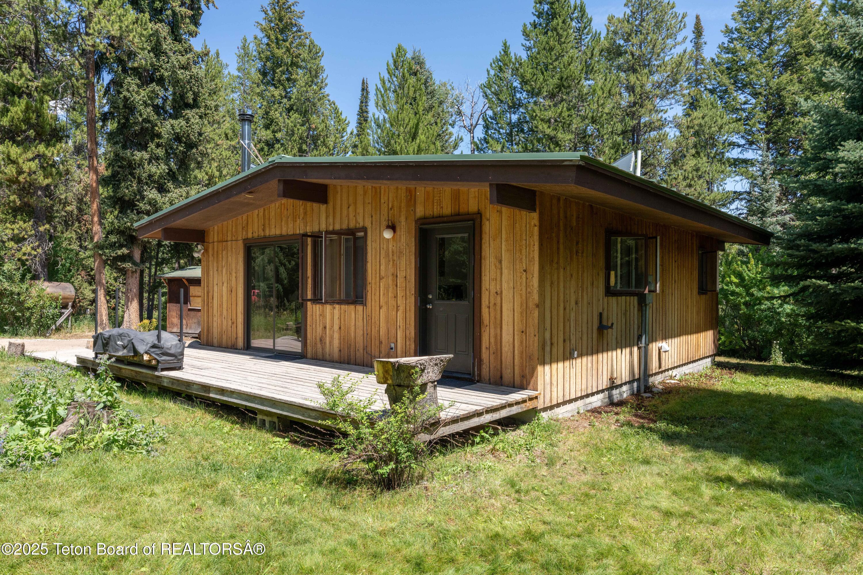 6255 Heck Of A Hill Road Wilson, WY 83014 - Photo 15 of 29 House Side