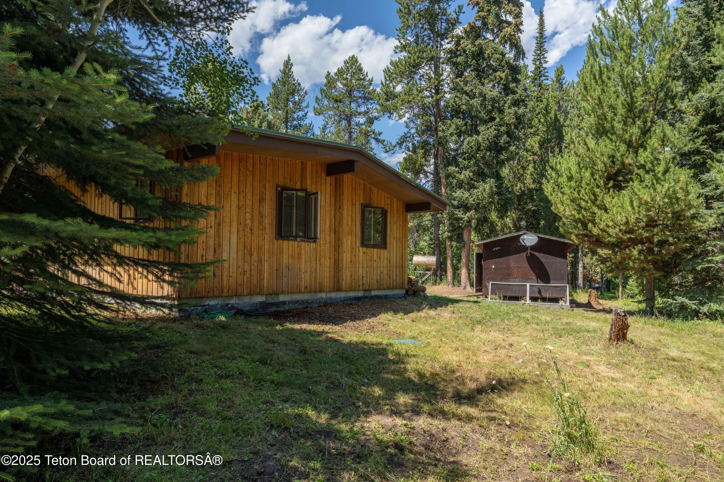 6255 Heck Of A Hill Road Wilson, WY 83014 - Photo 16 of 29 House + Shed