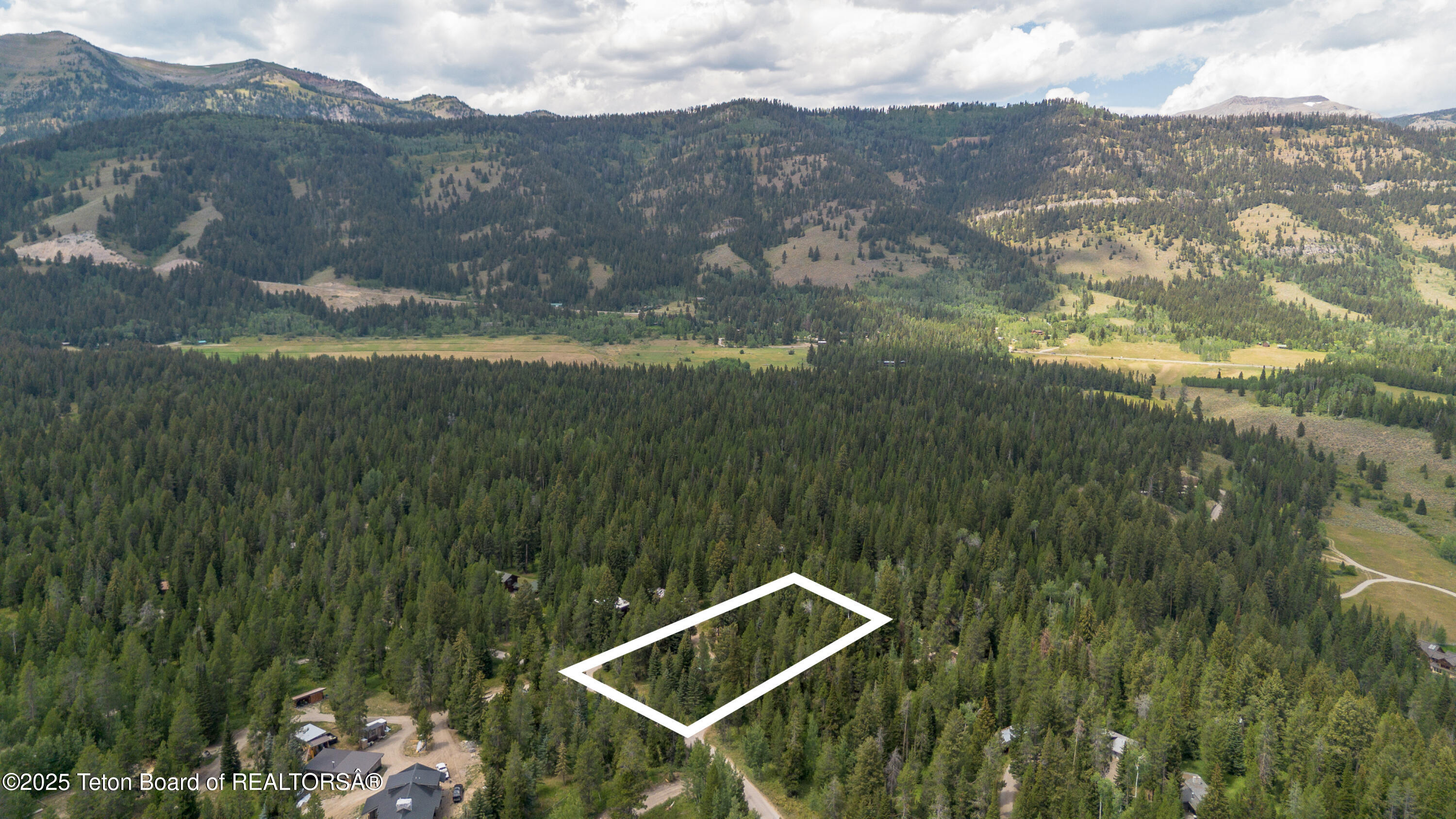 6255 Heck Of A Hill Road Wilson, WY 83014 - Photo 26 of 29 Drone With Wilson Faces