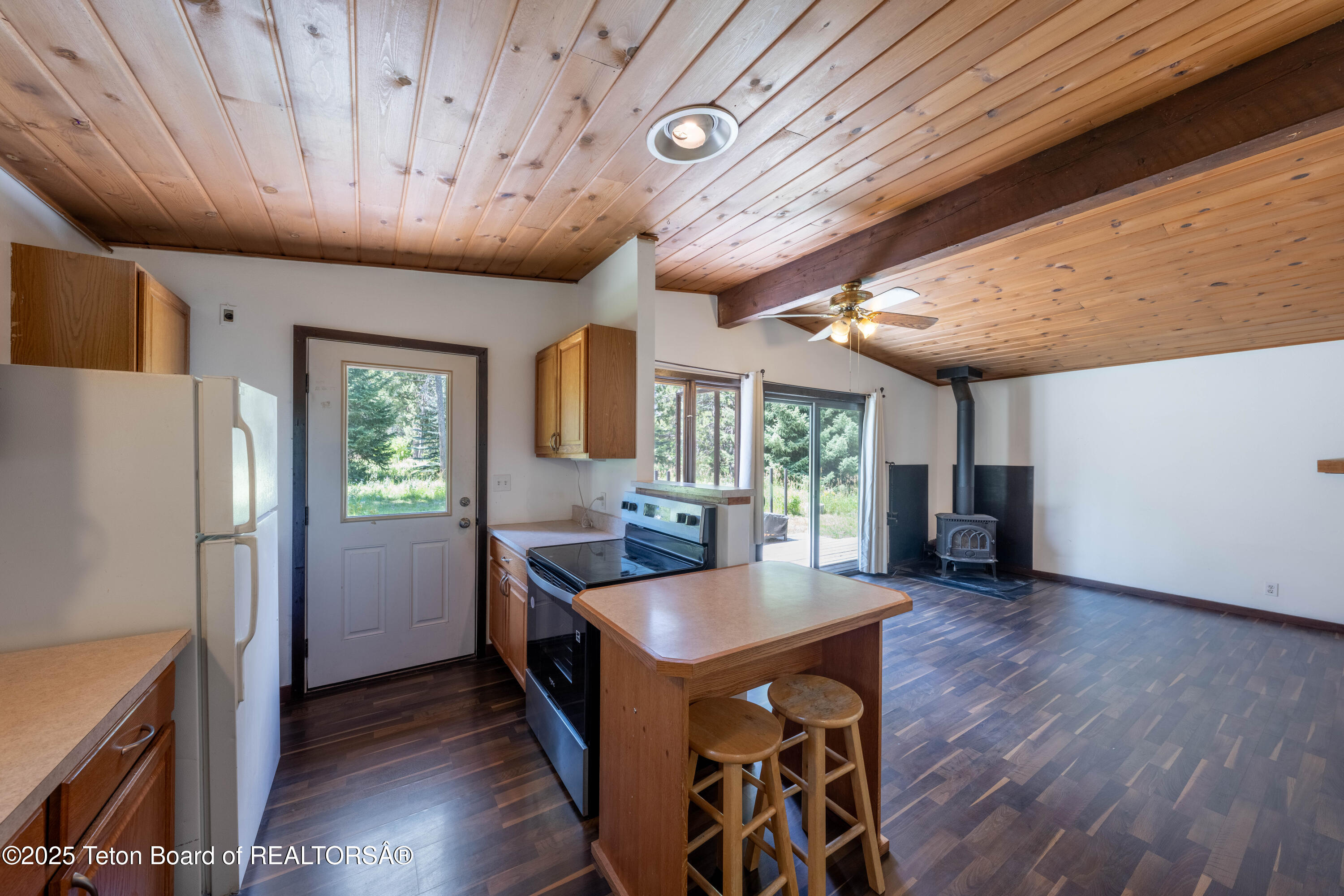 6255 Heck Of A Hill Road Wilson, WY 83014 - Photo 3 of 29 Kitchen and Living Area