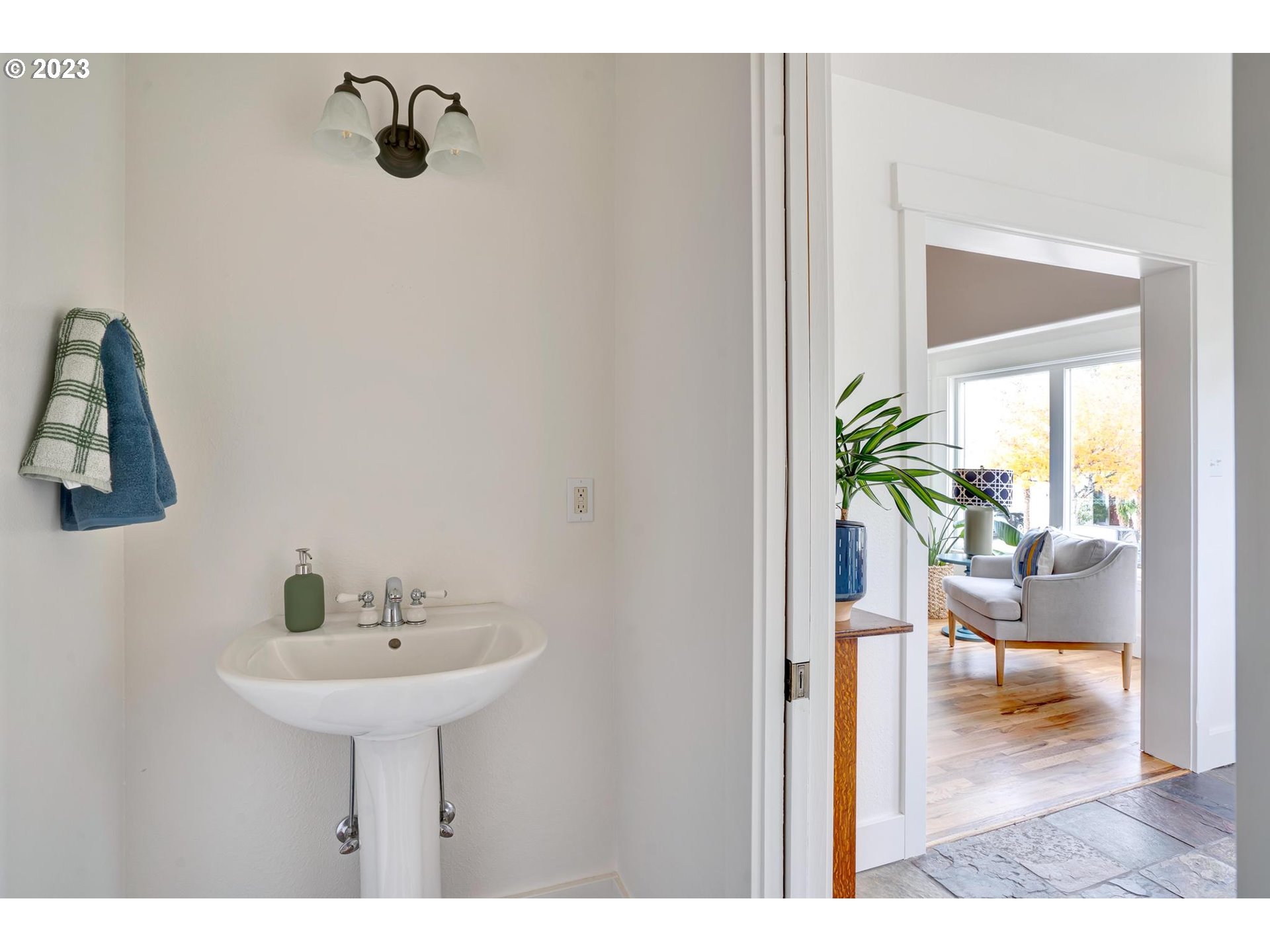15125 Southeast Aston Loop Portland, OR 97236 - Photo 5 of 42 a bathroom with a sink and a mirror
