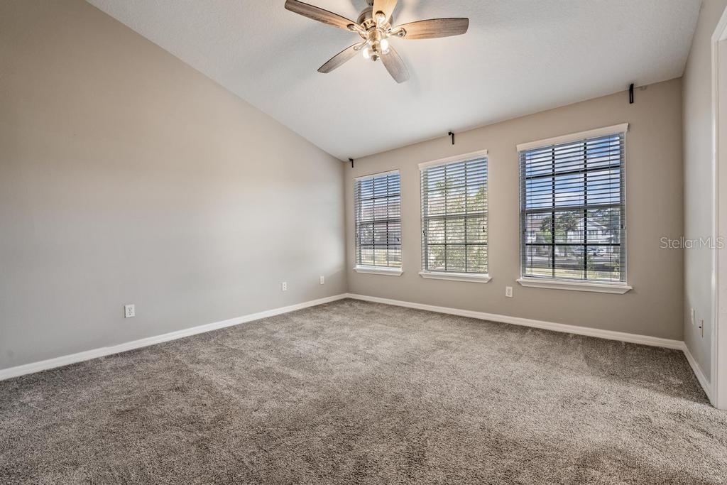 8512 Shallow Creek Court New Port Richey, FL 34653 - Photo 20 of 45 a view of an empty room with a window