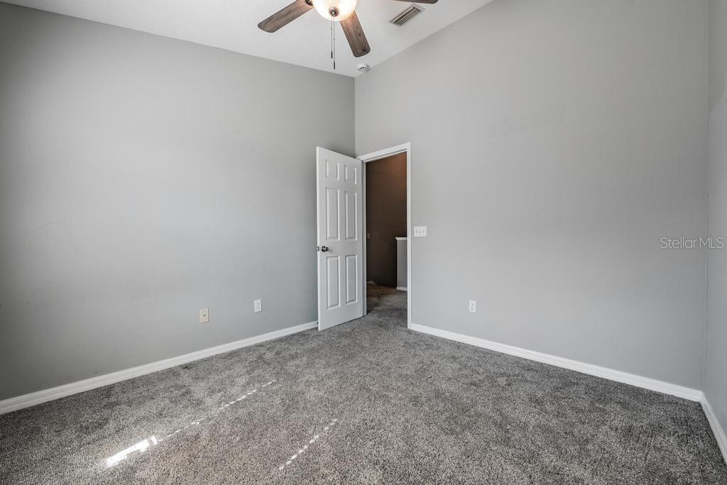 8512 Shallow Creek Court New Port Richey, FL 34653 - Photo 21 of 45 a view of an empty room