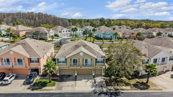 an aerial view of a house with a garden