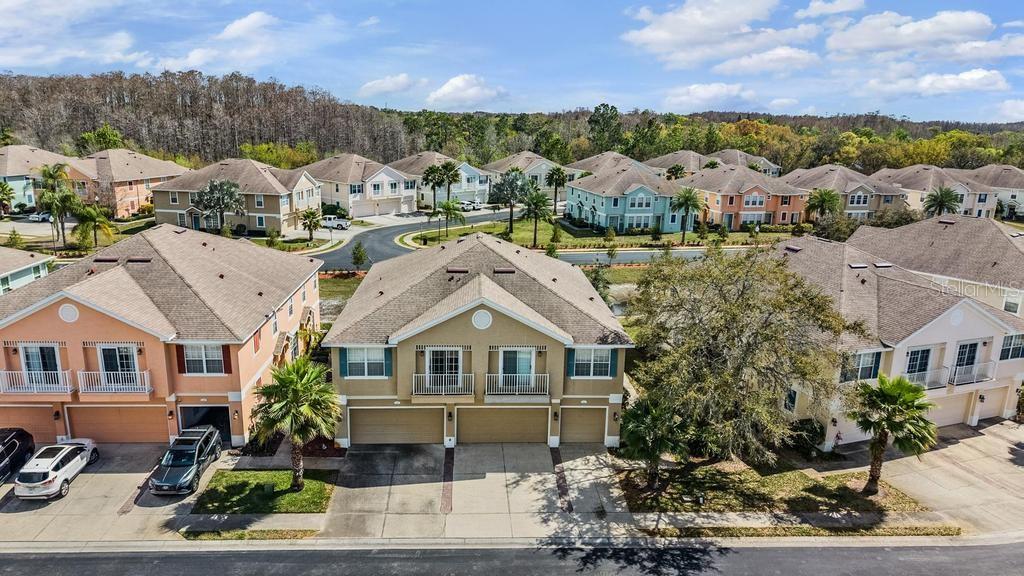8512 Shallow Creek Court New Port Richey, FL 34653 - Photo 39 of 45 an aerial view of a house with a yard
