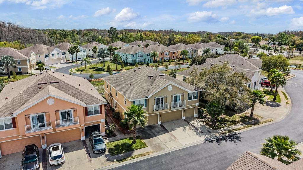 8512 Shallow Creek Court New Port Richey, FL 34653 - Photo 40 of 45 an aerial view of a house with a garden