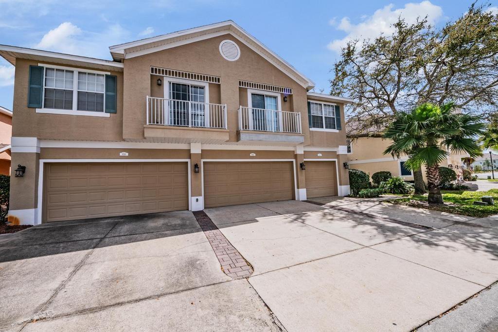 8512 Shallow Creek Court New Port Richey, FL 34653 - Photo 45 of 45 a front view of house with yard