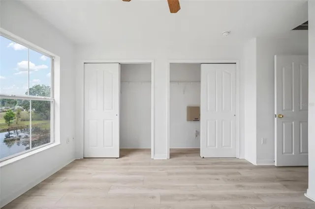 an empty room with windows