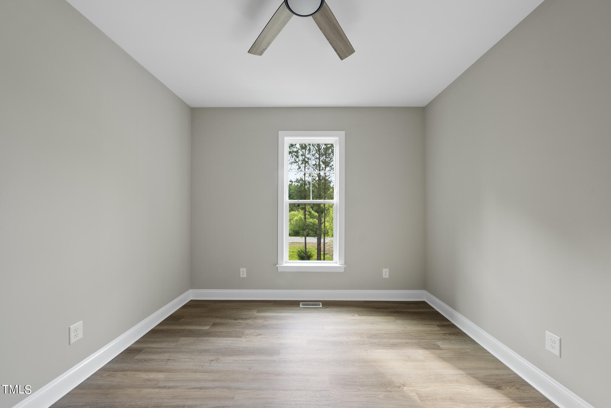 130 Pilot Ridge Road Zebulon, NC 27597 - Photo 26 of 39 a view of a room with a window and wooden floor