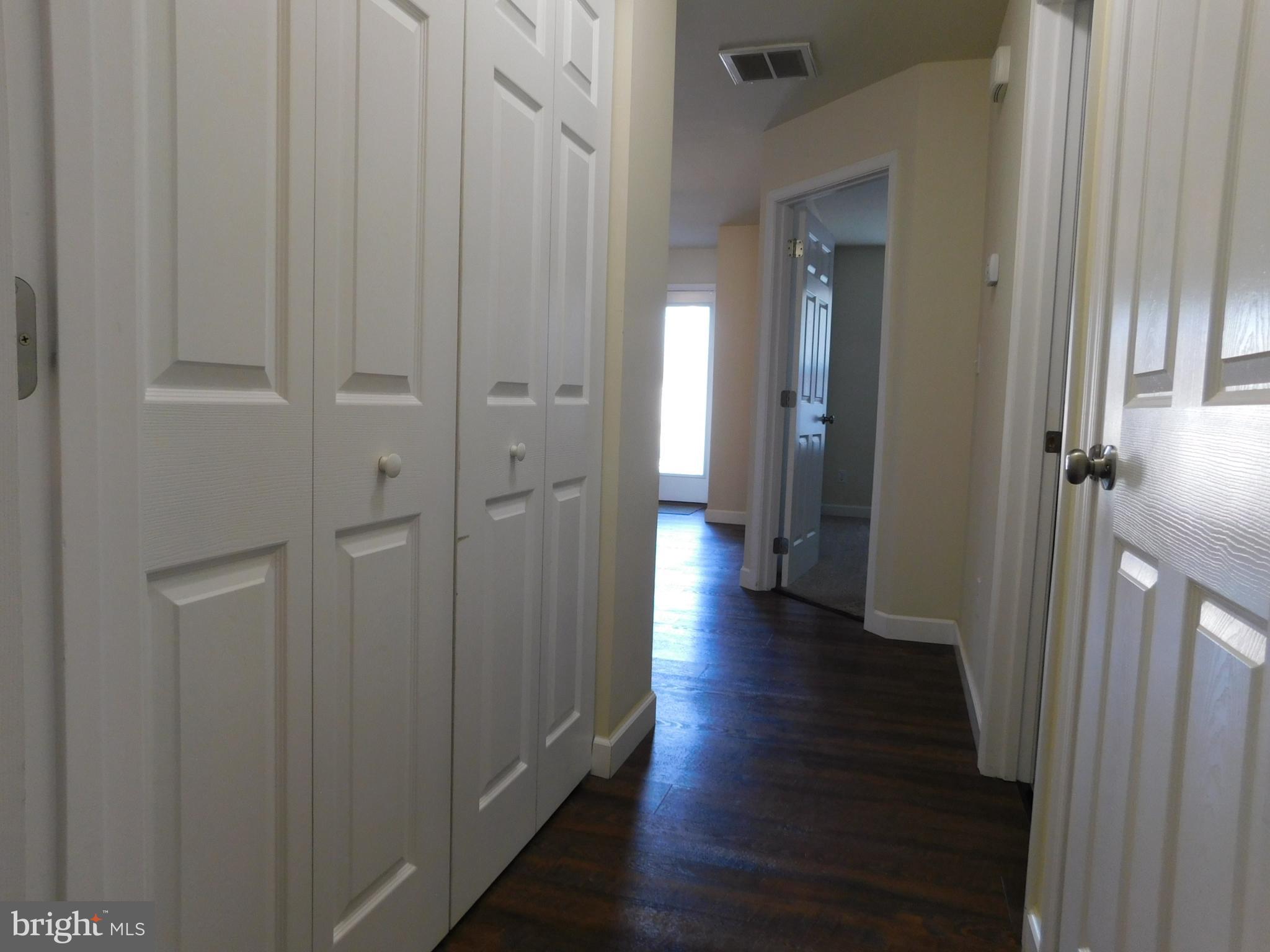 424 Eisenhower Drive Chambersburg, PA 17201 - Photo 15 of 30 a view of a hallway with wooden floor