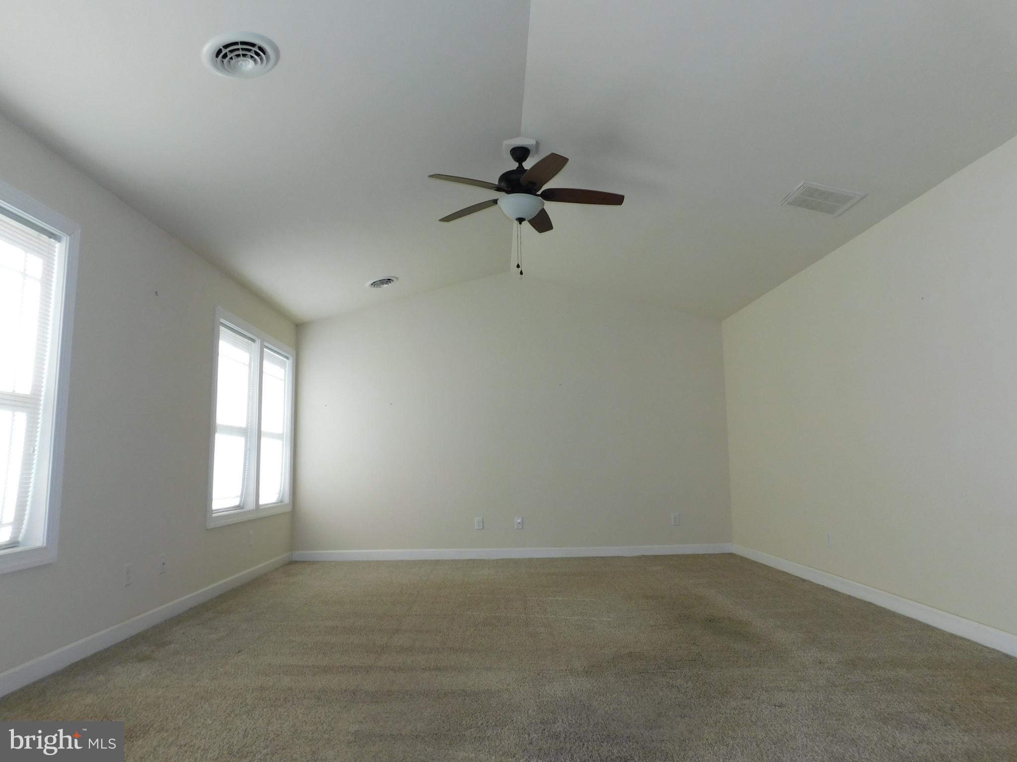 424 Eisenhower Drive Chambersburg, PA 17201 - Photo 18 of 30 an empty room with windows and fan