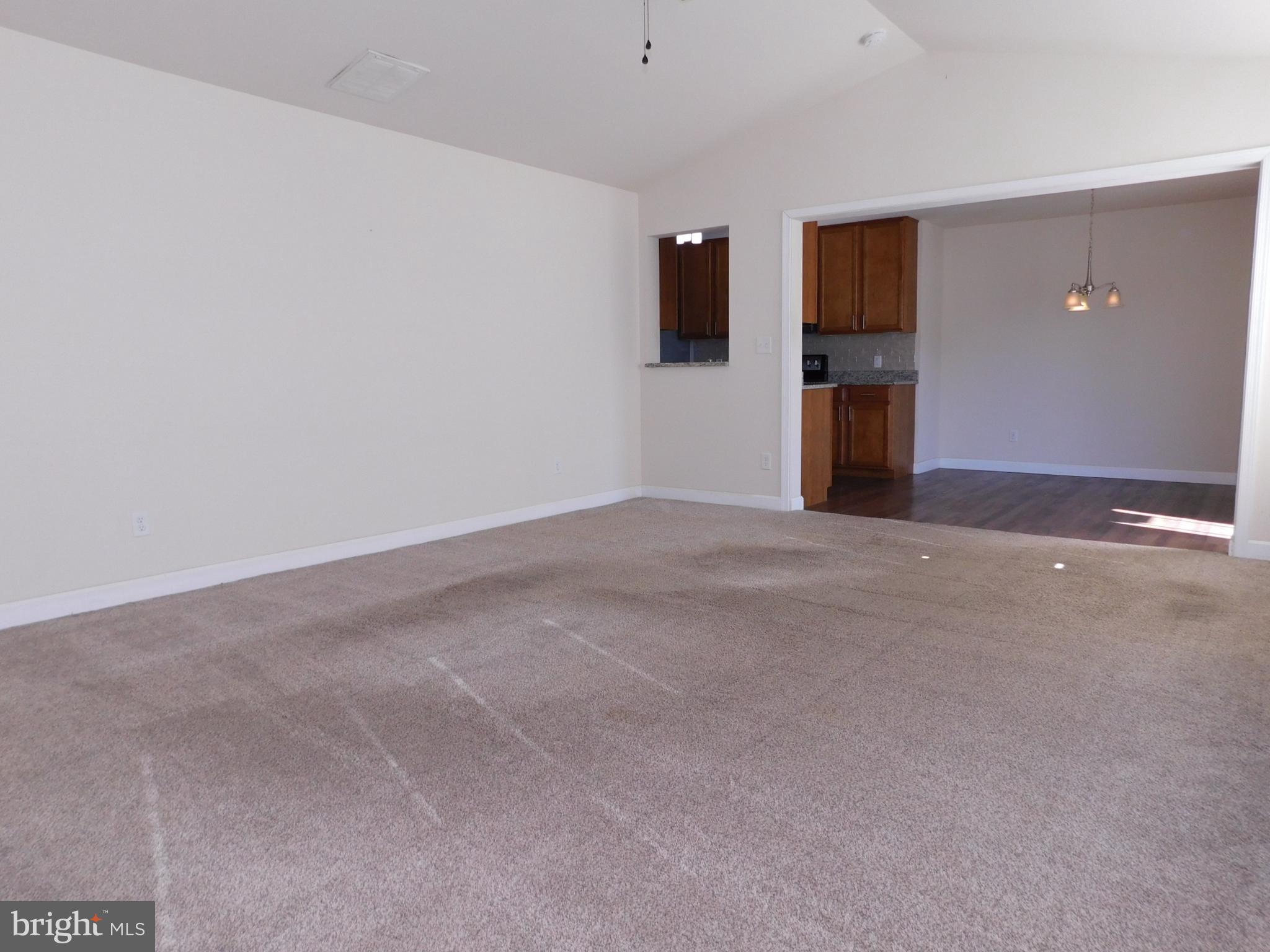 424 Eisenhower Drive Chambersburg, PA 17201 - Photo 19 of 30 a view of a livingroom with a flat screen tv