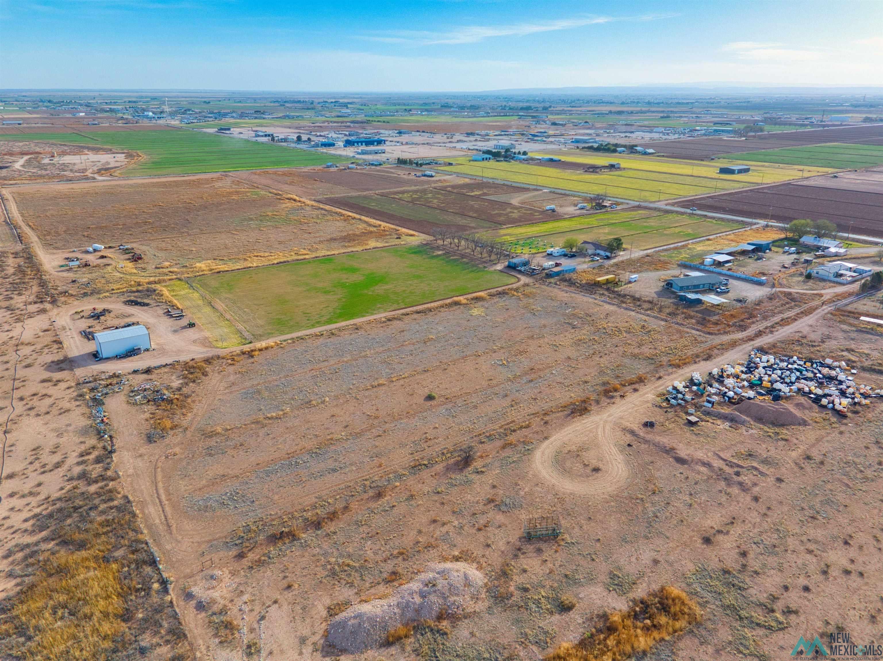 3328 Grandi Rural Road Carlsbad, NM 88220 - Photo 4 of 11 View of rural area with rows of crops