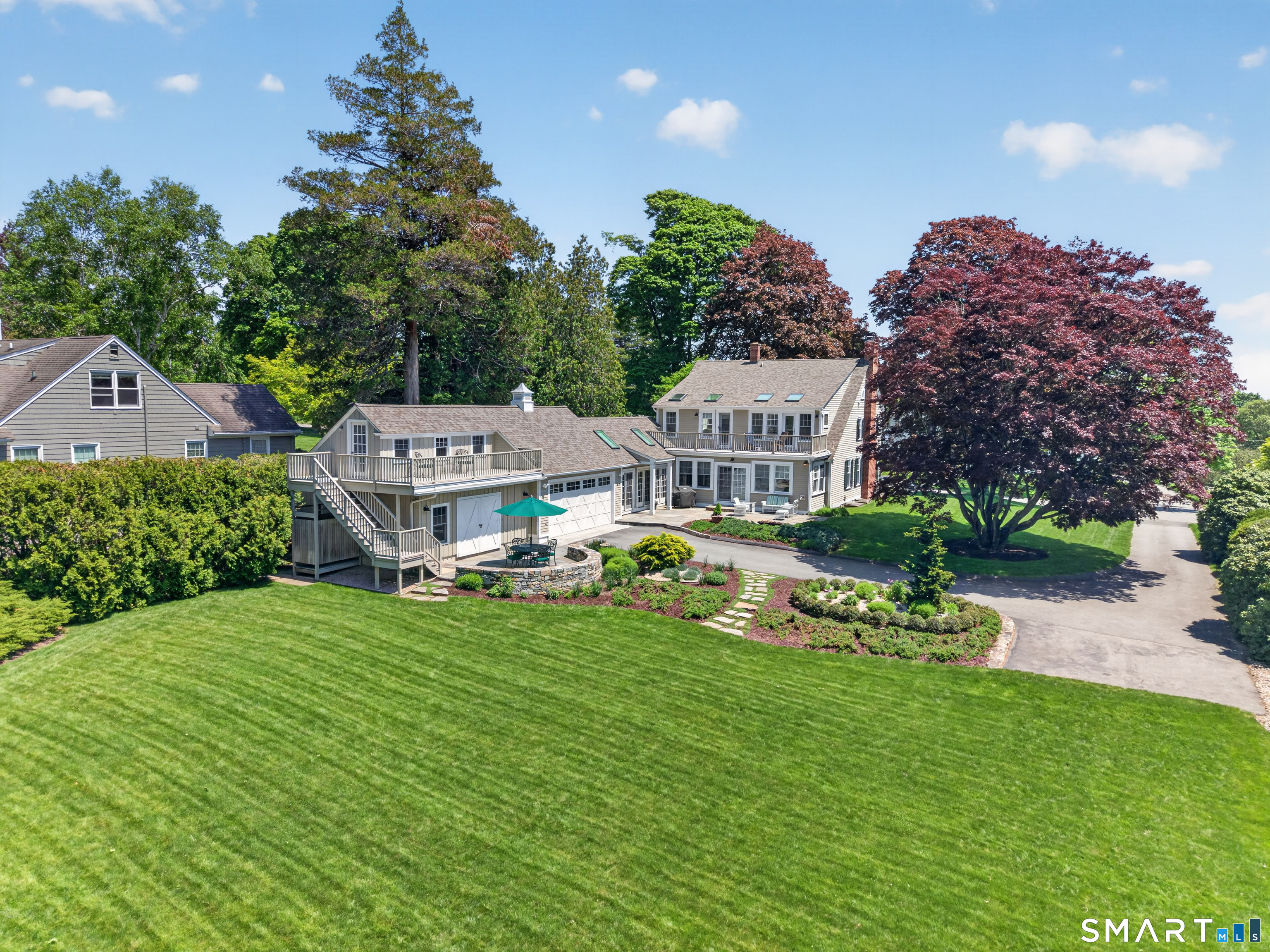 10 Prospect Street Groton, CT 06355 - Photo 24 of 40 a view of a house with a garden and plants