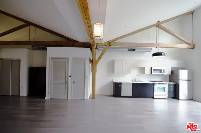 a view of kitchen and front door